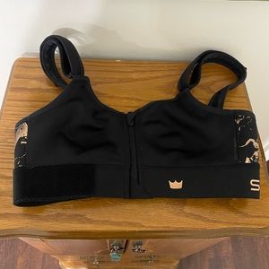 Black and rose gold SHEFIT sports bra. Like new. Size small